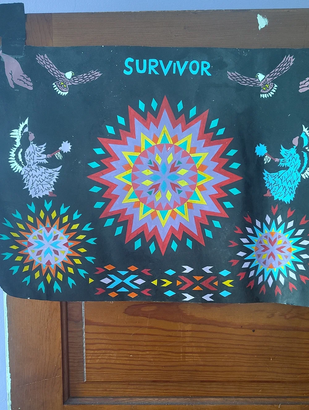 Survivor Black Tapestry with Multicolor Starburst Motifs